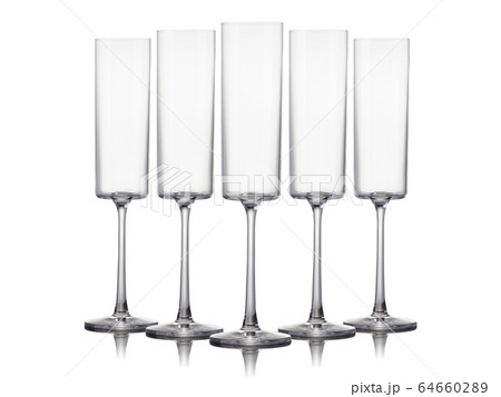 Set of empty champagne glasses in a row isolated 64660289