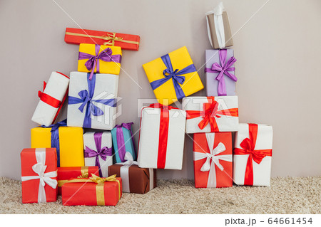 lots of multi-colored gifts on a gray background lots of multi-colored gifts on a gray background 64661454