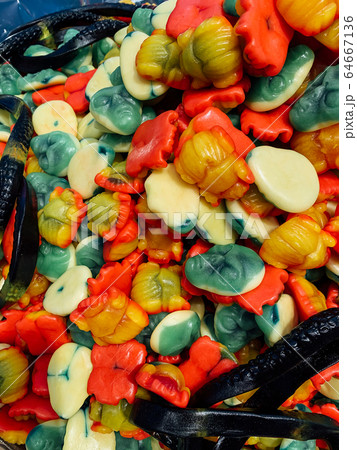 lots of delicious sweet candies to eat like a background 64667136
