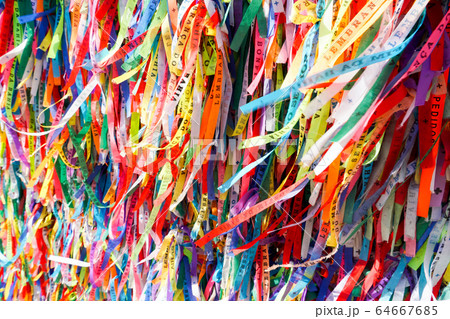 Famous touristic place where people make wishes while tie the ribbons in front of the church. Famous touristic place where people make wishes while tie the ribbons in front of the church. 64667685