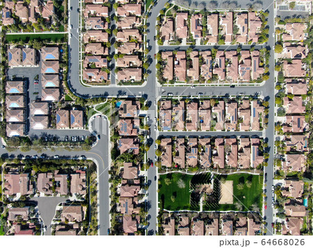 Aerial view suburban neighborhood with identical villas next to each other. San Diego, California 64668026