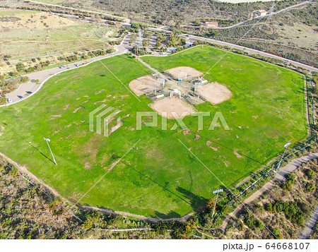 Aerial top view of Community park baseball sports field. 64668107
