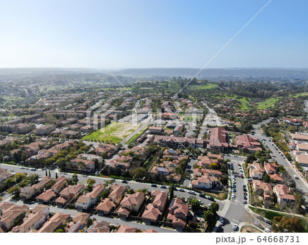 Aerial view suburban neighborhood with identical villas next to each other. San Diego, California Aerial view suburban neighborhood with identical villas next to each other. San Diego, California 64668731