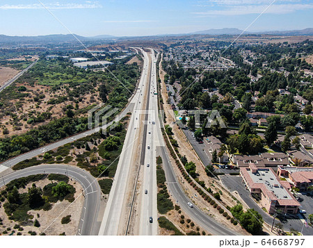 Aerial view of highway crossing the little town Moorpark, California Aerial view of highway crossing the little town Moorpark, California 64668797