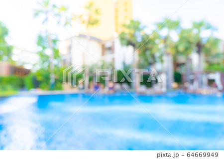 Abstract blur and defocus outdoor swimming pool in hotel resort for background Abstract blur and defocus outdoor swimming pool in hotel resort for background 64669949