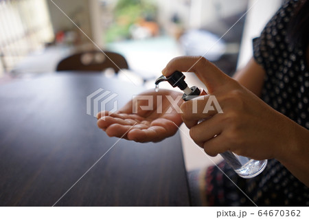 Wash hands with alcohol gel. To prevent the coronavirus outbreak covid-19 Wash hands with alcohol gel. To prevent the coronavirus outbreak covid-19 64670362