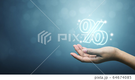 Interest rate financial and mortgage rates concept. Hand showing icon percent 3d sign symbol Interest rate financial and mortgage rates concept. Hand showing icon percent 3d sign symbol 64674085