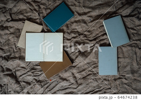 many educational books lies on the table 64674238