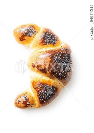 Sweet homemade croissant with poppy. Sweet homemade croissant with poppy. 64674513