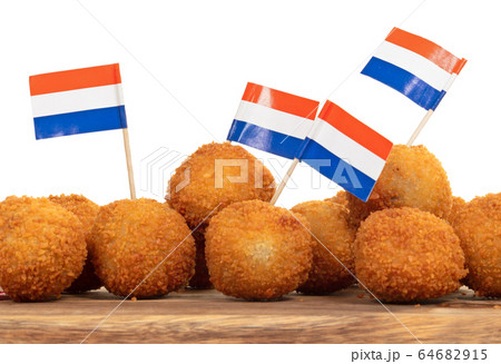 Dutch traditional snack bitterbal on a serving Dutch traditional snack bitterbal on a serving 64682915