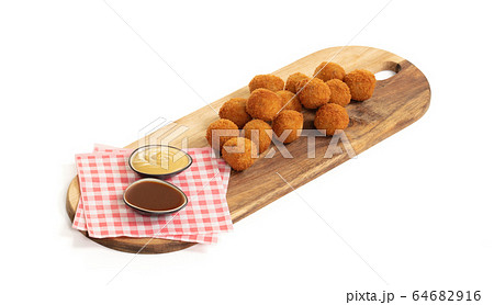 Dutch traditional snack bitterbal on a serving Dutch traditional snack bitterbal on a serving 64682916
