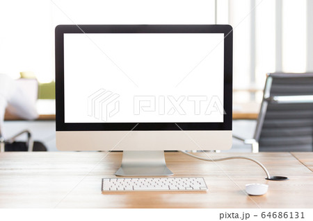 Mock up monitor computer screen with keyboard on office desk 64686131