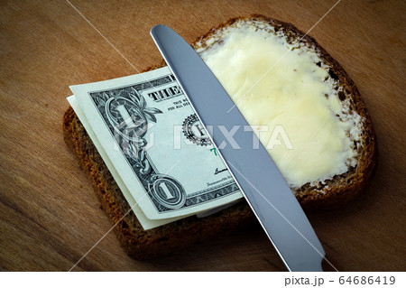 Butter and money on bread 64686419