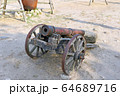 An old cannon on wheels 64689716