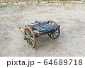 An old cannon on wheels 64689718