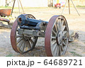 An old cannon on wheels 64689721