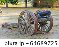 An old cannon on wheels 64689725