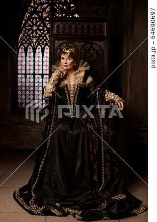 Mature woman in costume of queen Mature woman in costume of queen 64690697
