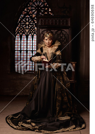 Mature woman in costume of queen Mature woman in costume of queen 64690698
