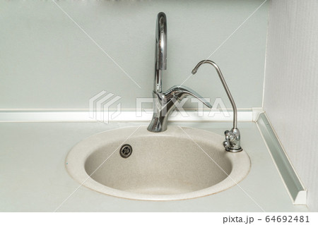The photo of a sink in a The photo of a sink in a  64692481