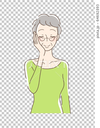 一個女人撫摸她的手掌與她的臉頰 一個女人撫摸她的手掌與她的臉頰 64692893
