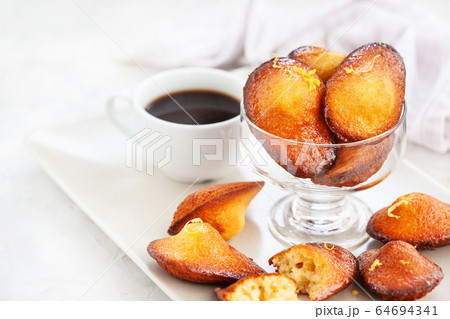 Homemade lemon madeleines biscuit cookies Homemade lemon madeleines biscuit cookies 64694341