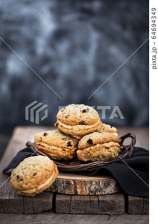 Homemade oatmeal sandwich cookies 64694349