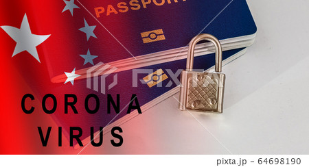 Coronavirus 2019-nCoV epidemic. China closing borders and restricted access. Chinese visa closeup with stamp mark Cancelled by 2019-nCoV and overlaid by flag. Chinese tests mean VISA details Coronavirus 2019-nCoV epidemic. China closing borders and restricted access. Chinese visa closeup with stamp mark Cancelled by 2019-nCoV and overlaid by flag. Chinese tests mean VISA details 64698190