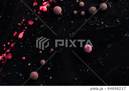 Stains of paint on the water surface. Abstract acrylic bubbles.  64699217
