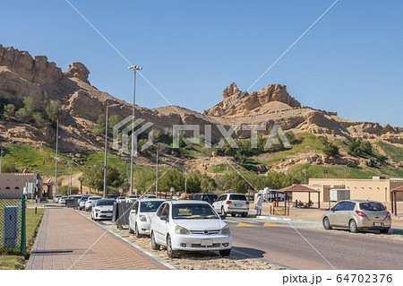 Mountains near the hot thermal springs in the United Arab Emirates near Ain Al. 64702376