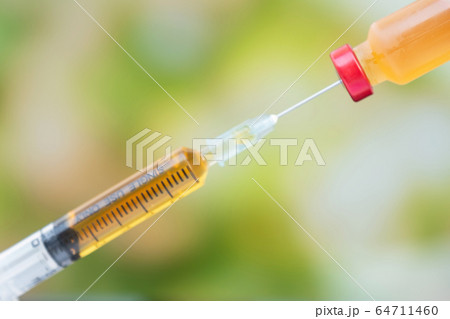 The picture of Yellow vaccine tube and syringe are The picture of Yellow vaccine tube and syringe are 64711460