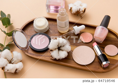makeup, perfume and cosmetics on wooden tray 64719546