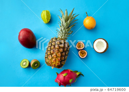 pineapple with other fruits on blue background 64719600