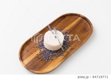 close up of crafted lavender soap on wooden tray close up of crafted lavender soap on wooden tray 64719771