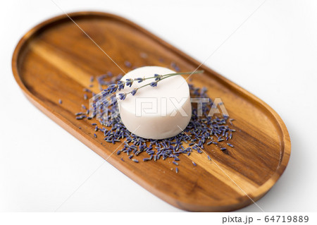 close up of crafted lavender soap on wooden tray close up of crafted lavender soap on wooden tray 64719889