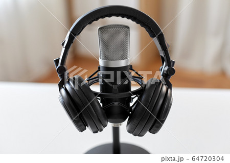 headphones and microphone at home office headphones and microphone at home office 64720304