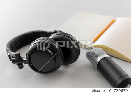 headphones, microphone and notebook with pencil headphones, microphone and notebook with pencil 64720679