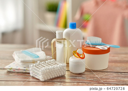 baby accessories for bathing on wooden table 64720728