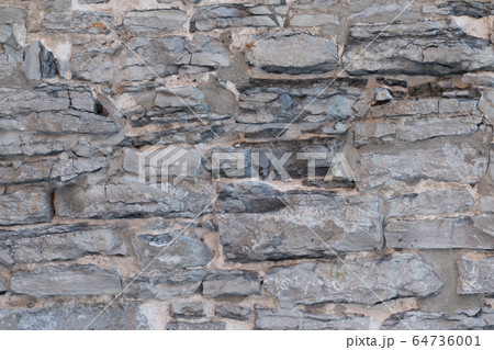 Old weathered granite stone wall textured naturOld weathered granite stone wall textured natural background al background Old weathered granite stone wall textured naturOld weathered granite stone wall textured natural background al background 64736001