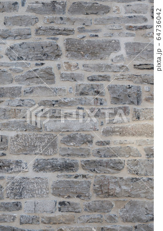 Old weathered granite stone wall textured natural background Old weathered granite stone wall textured natural background 64736042