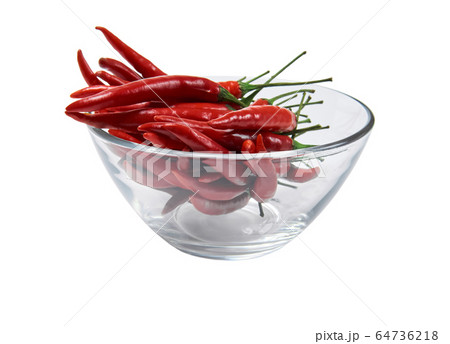 glass cup with pods of red hot pepper isolated on glass cup with pods of red hot pepper isolated on 64736218
