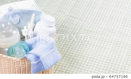 Newborn baby care supplies on changing table. 64737190