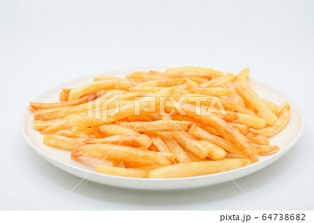 French fries on white dish and white background. French fries on white dish and white background. 64738682