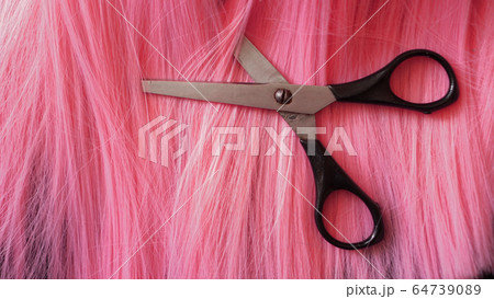 Wig and scissors - pink wig - hairstyle background Wig and scissors - pink wig - hairstyle background 64739089
