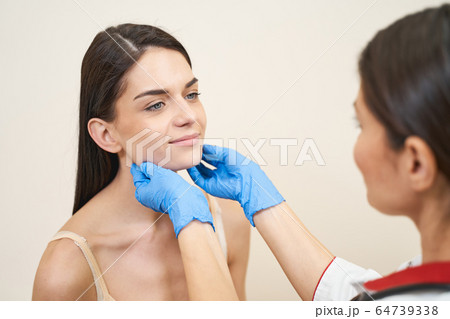 Positive delighted females looking at each other Positive delighted females looking at each other 64739338