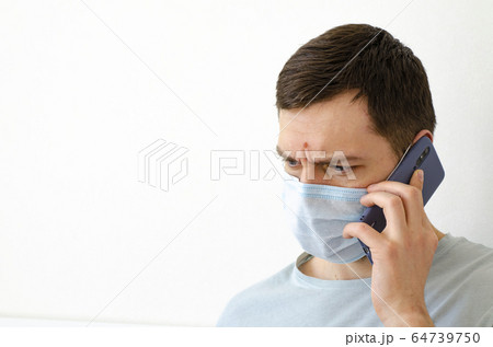 Coronavirus. Quarantine. A man solves work issues 64739750