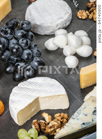 different types of cheese with fruits, nuts and snacks different types of cheese with fruits, nuts and snacks 64740900