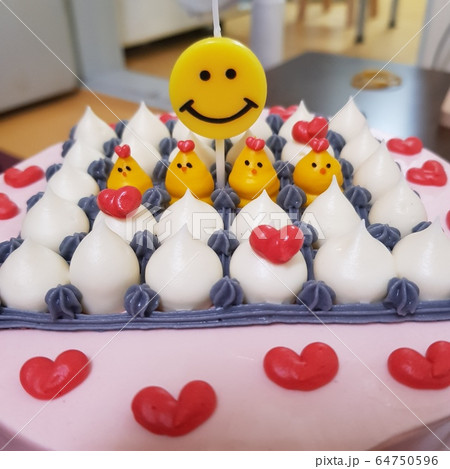 ケーキ スマイル 誕生日の写真素材