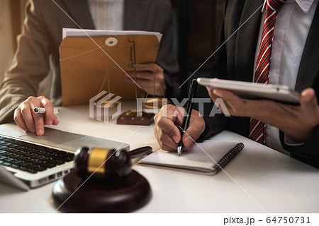 Businessman and Male lawyer or judge consult having team meeting with client, Law and Legal services concept. 64750731