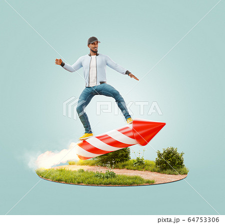 Young man riding on a firework rocket Young man riding on a firework rocket 64753306